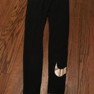 NIKE rose gold swoosh leggings